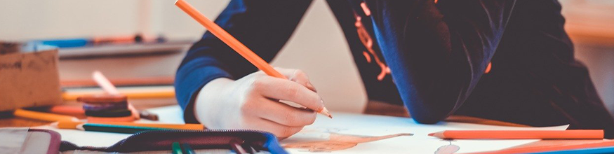 student with pencil in hand